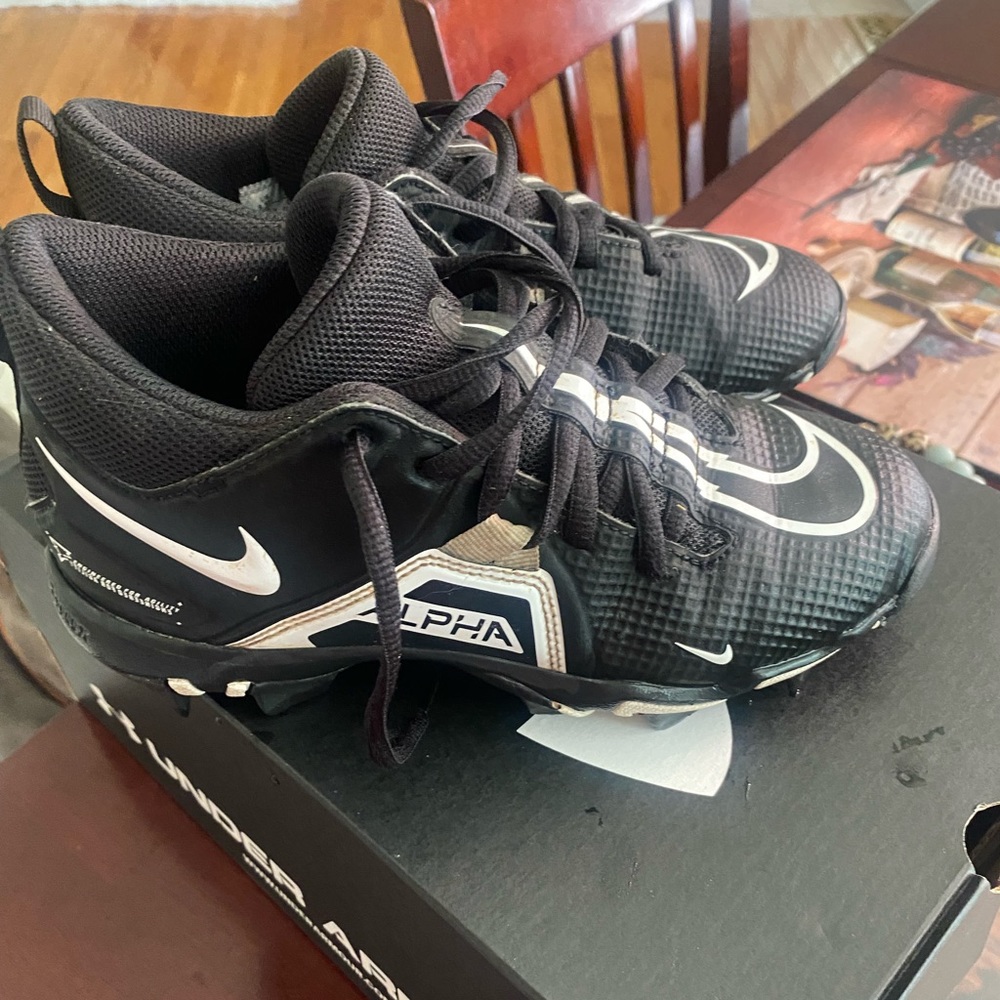 Black Nike football cleats 3.5